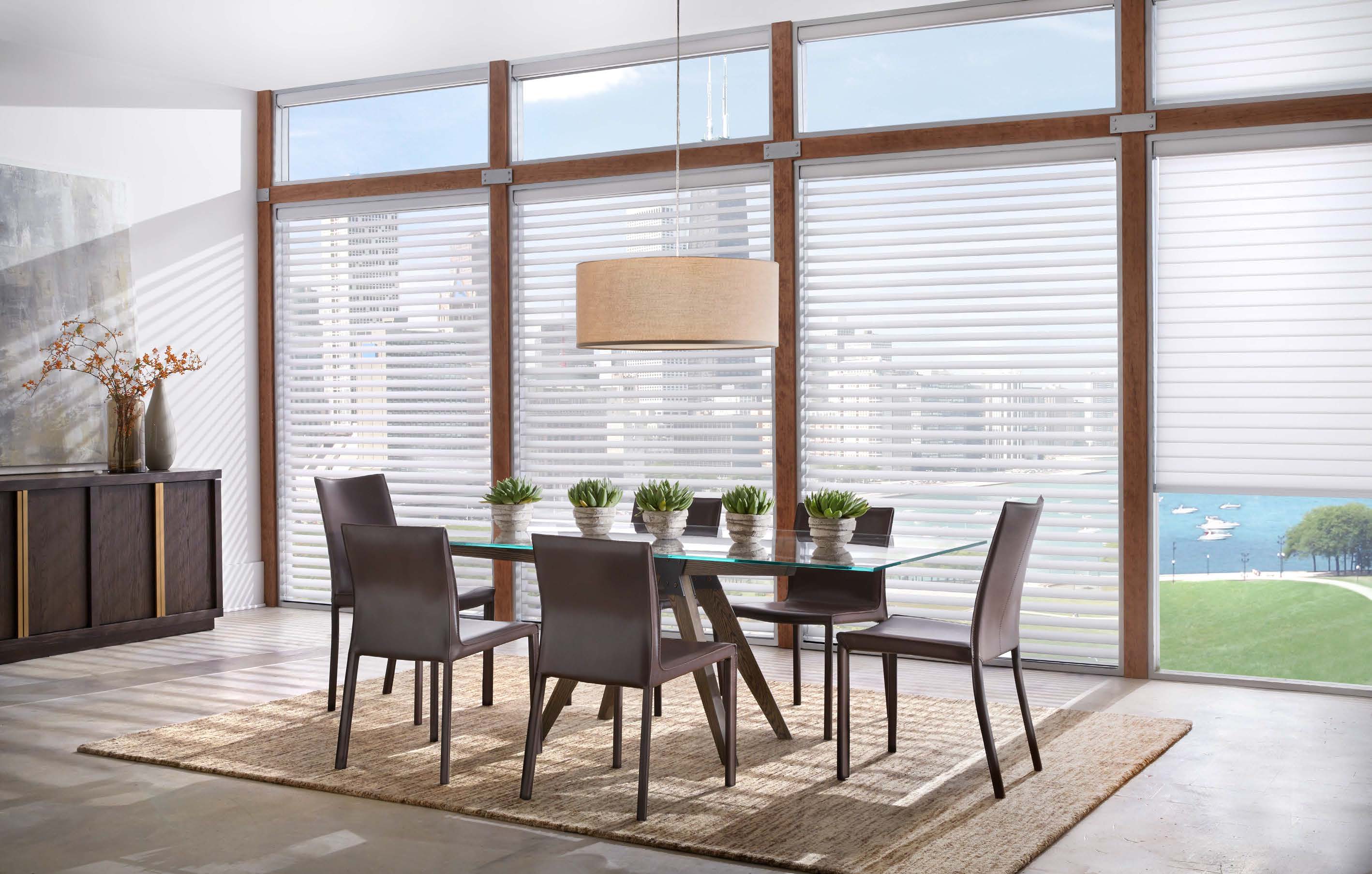 Sheer shadings with tilted fabric vanes between dual sheer layers